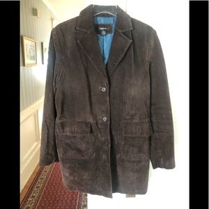 Woman’s brown suede coat